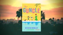 The book, "The Guncle" by Steven Rowley with a city backdrop.